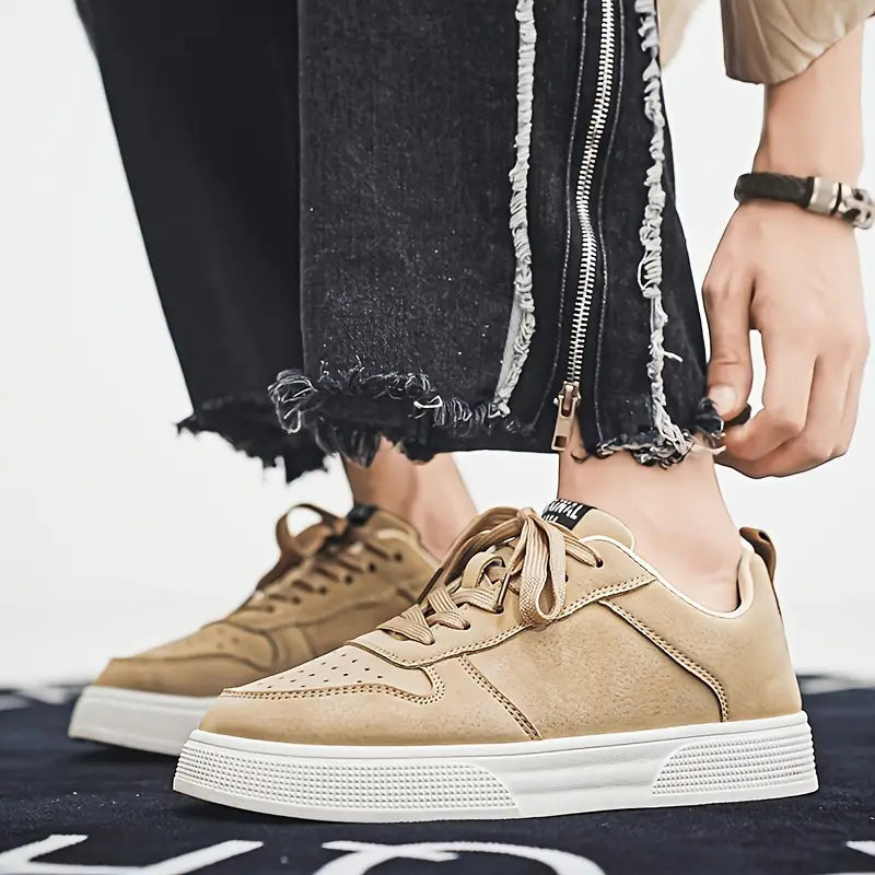 Pair of versatile black casual shoes for men, angled view