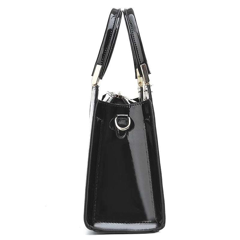 Side profile of the black handbag showing width and attachment ring for the shoulder strap