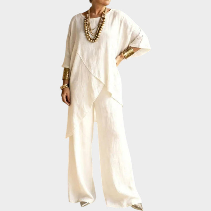 Side view of women's asymmetrical tunic matching set showing flowy hemline