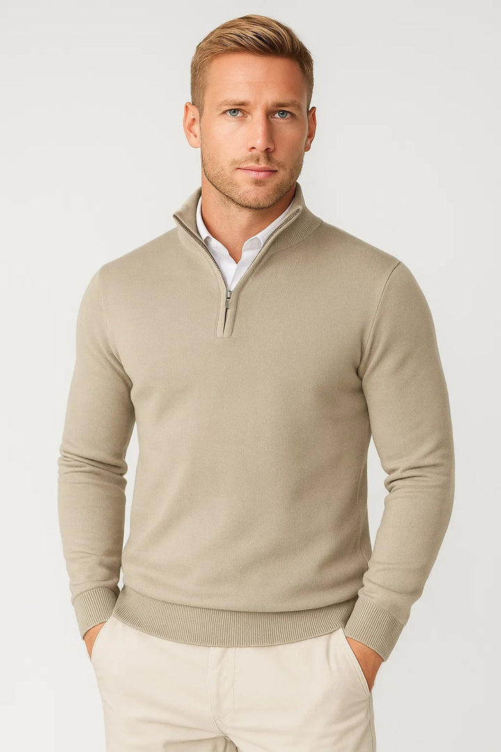 Lifestyle shot of man wearing modern half zip high neck sweater outdoors