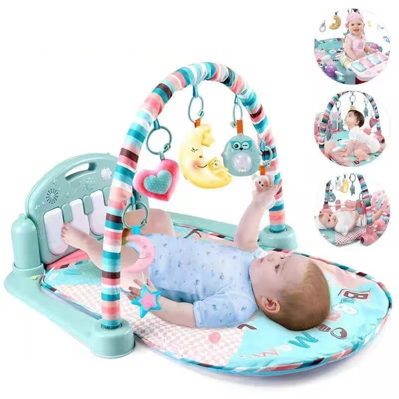 Baby lying on interactive musical play mat with piano and overhead toys