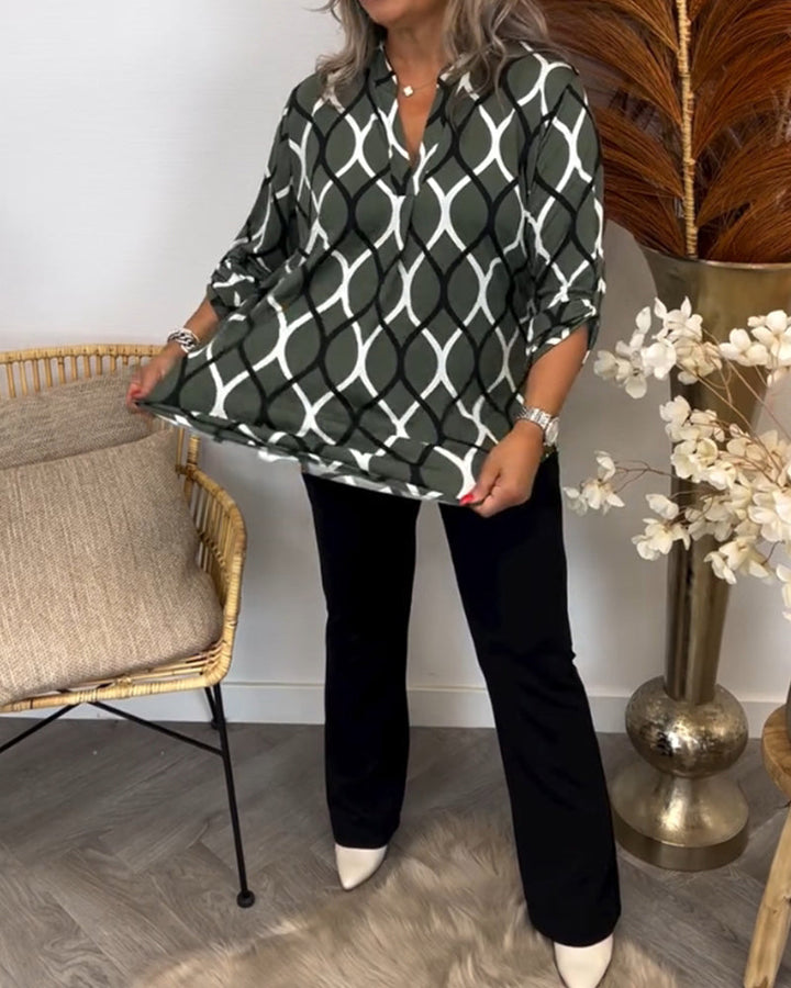 Detail of the cuff and sleeve on the women's casual geometric blouse