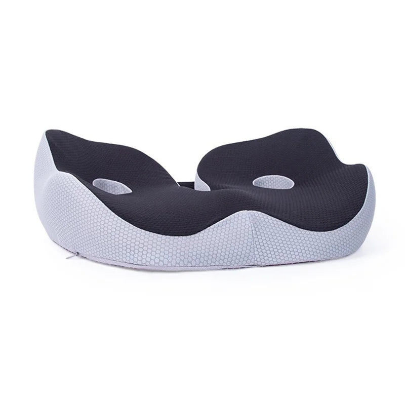 Memory foam seat pad placed on modern desk chair for lower back pain relief