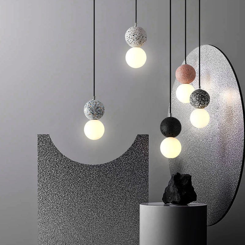 Collection of modern LED pendant lights displayed in a stylish interior setting with soft lighting