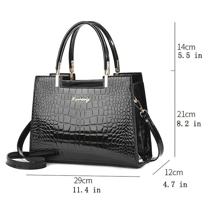 Luxury women's handbag featuring a detachable strap for versatility