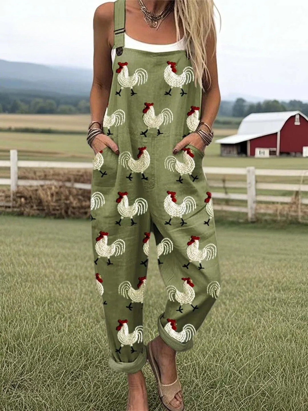 Woman wearing green casual printed jumpsuit with rooster motifs and pockets