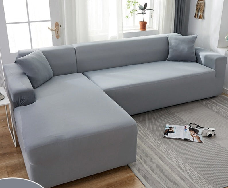 Pet-friendly stretch slipcover shielding couch cushions from dirt and hair