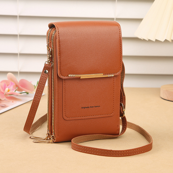 Daily shoulder bag shown in alternative color highlighting durable hardware and stitching