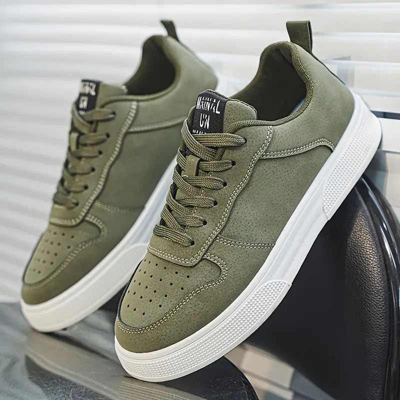 Green men's walking shoes with white sole and classic laces