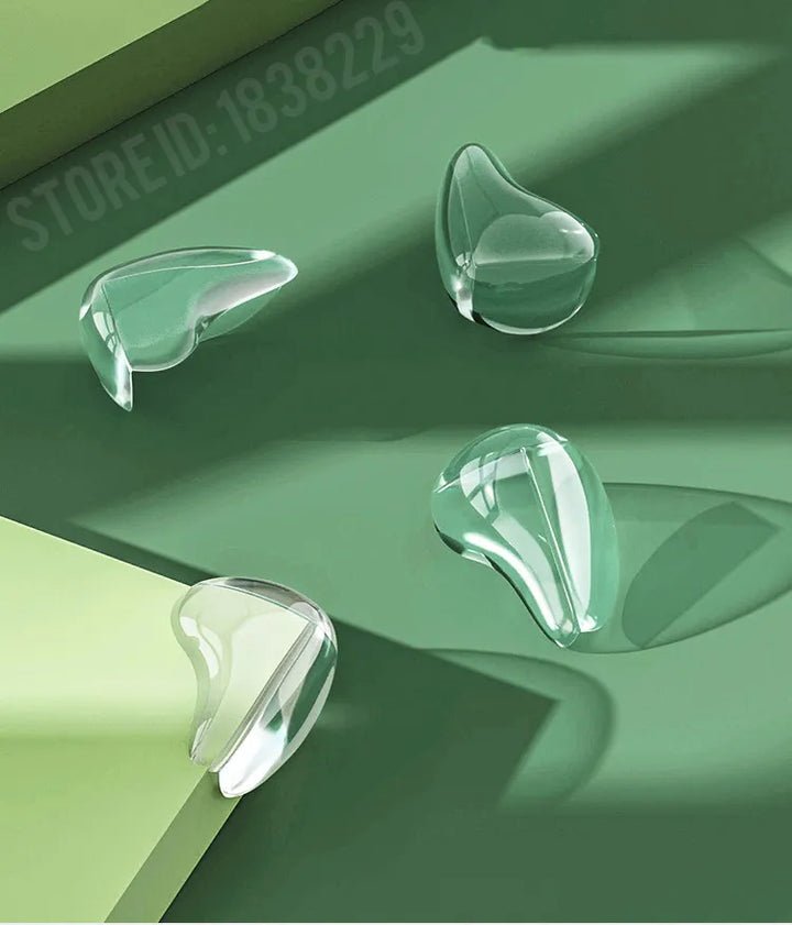 Demonstration of flexible clear table guards applied to a sharp cabinet corner for safety