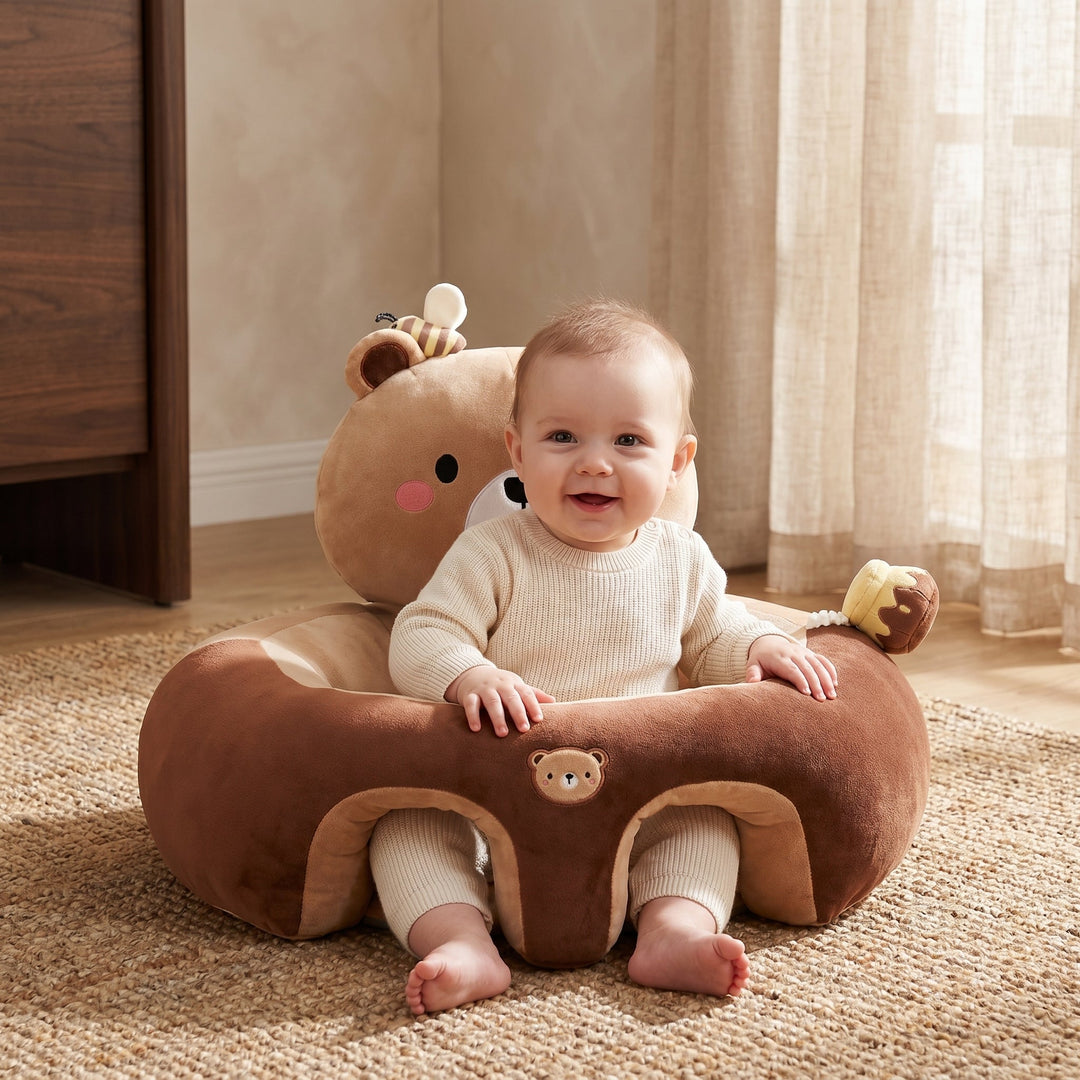 Plush infant chair providing safe 360 sitting support for babies learning to sit