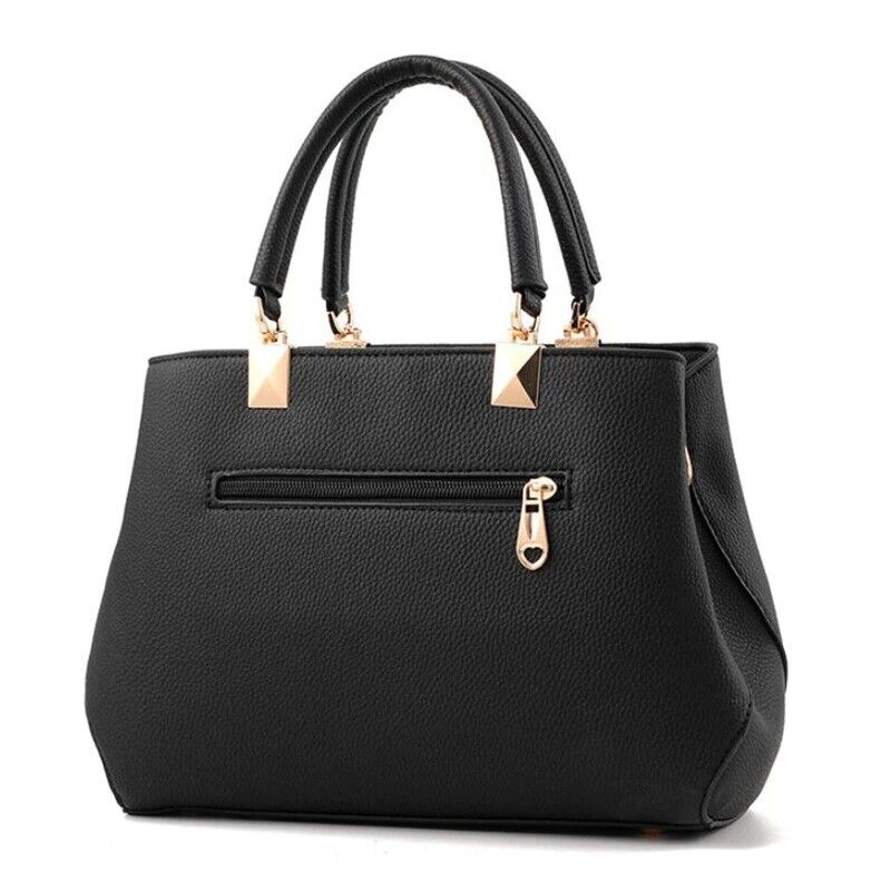 Side view of women's fashionable handbag featuring sleek leather-look design
