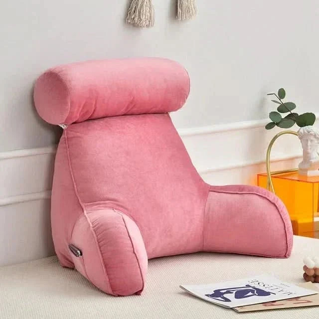 Pink comfortable reading pillow with adjustable headrest support