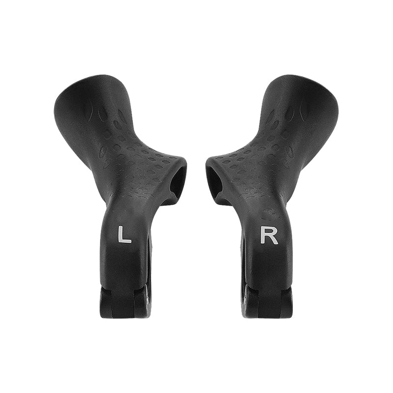 Rider hands holding comfortable handlebar grips on a bicycle