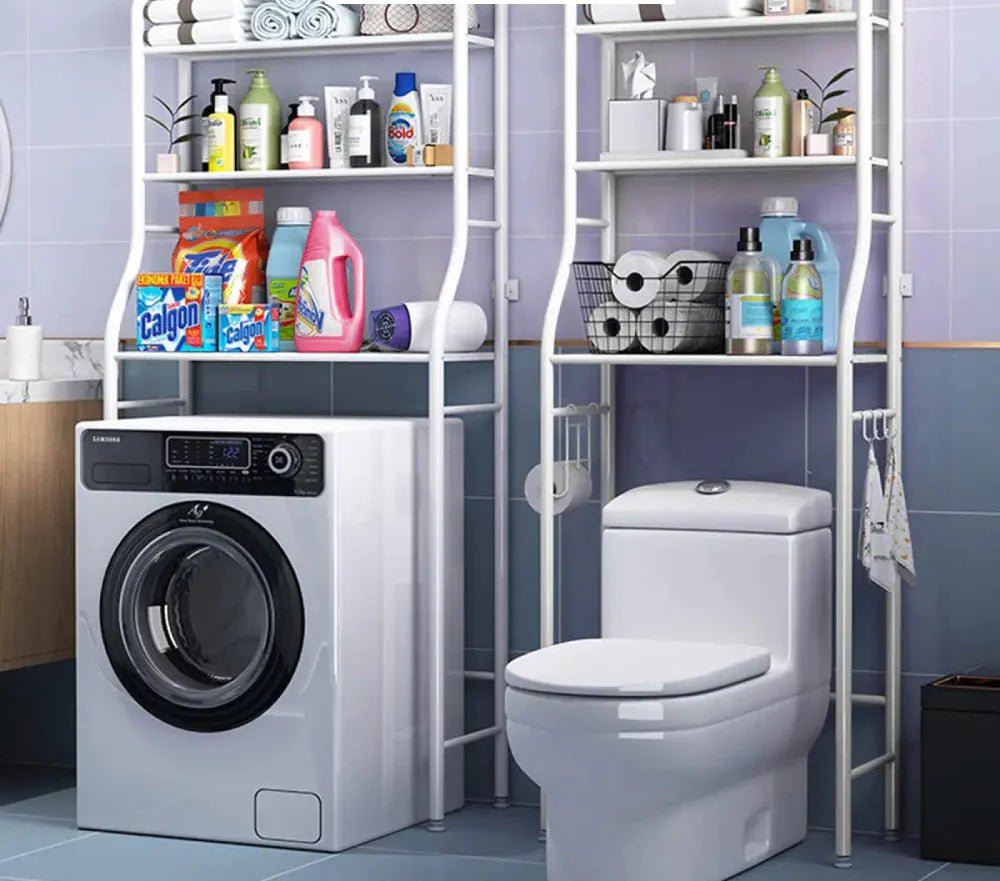 White over-toilet shelving unit positioned above a washing machine and toilet