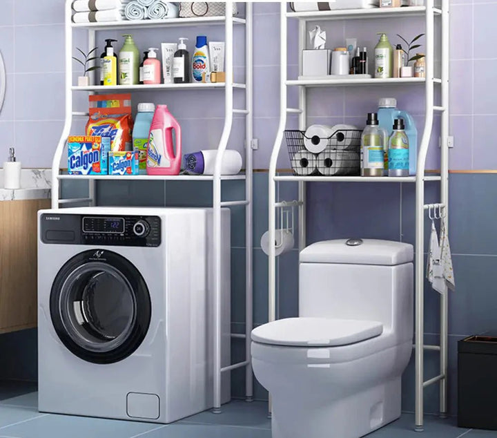 White over-toilet shelving unit positioned above a washing machine and toilet