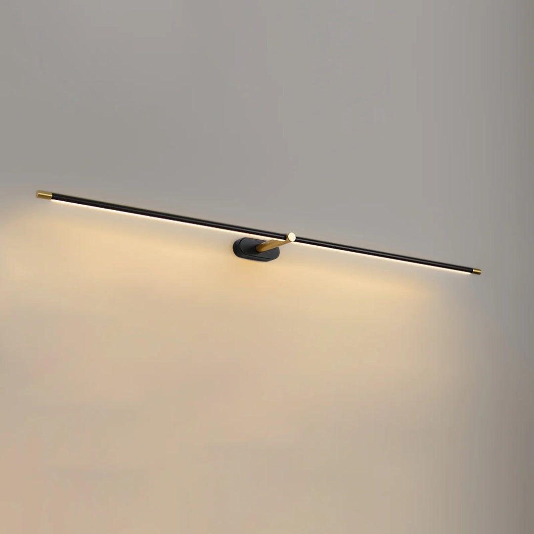 Black minimalist LED bathroom wall light illuminated against a neutral wall