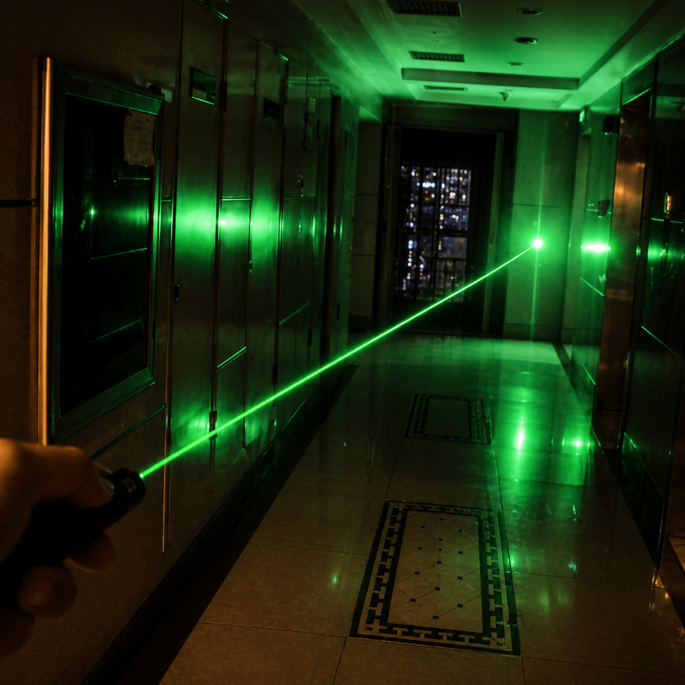 Rechargeable long range laser pointer showing adjustable focus beam mechanism