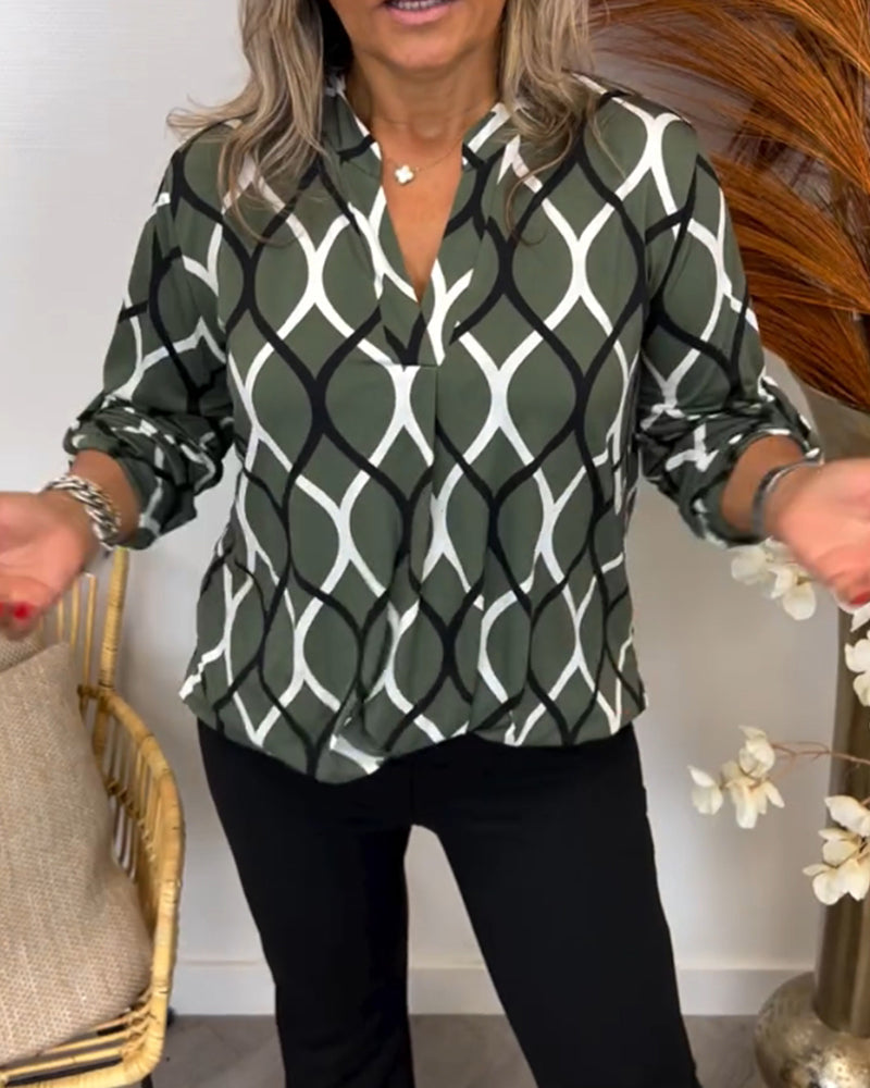 Side profile of the green patterned long-sleeve blouse for daily wear