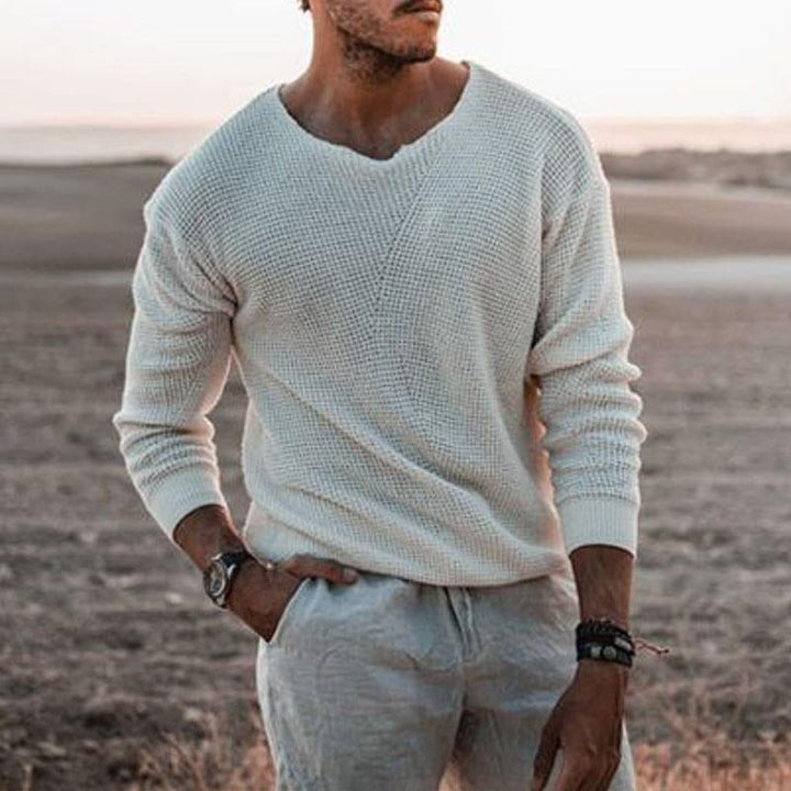 Men's casual white soft knit sweater outdoors