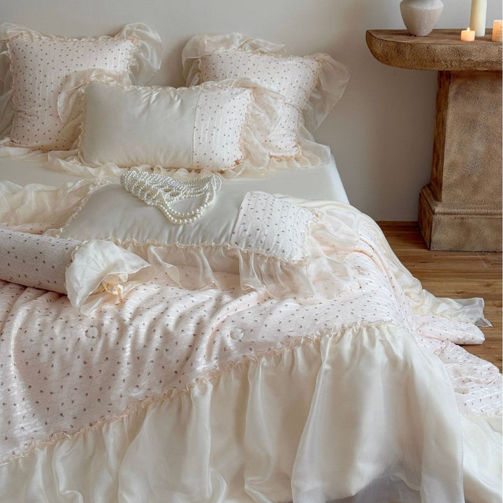 Full view of the luxury ruffled bedding set styled in a cozy bedroom