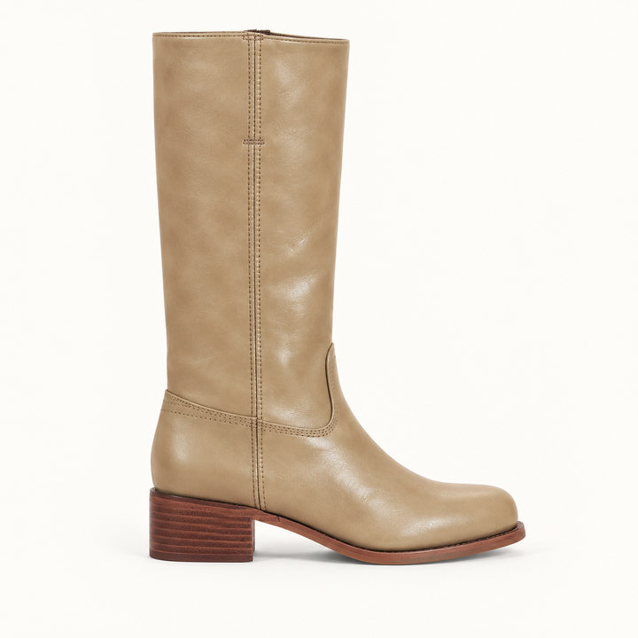 Full length view of women's tall boots featuring a stable block heel