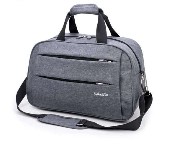 Convertible carry-on luggage showing side handle for briefcase style