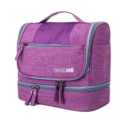 Purple hanging cosmetic bag organizer showing front pocket design