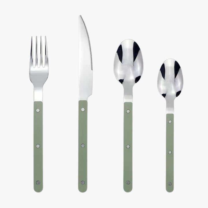 Stylish stainless steel dinner knife highlighting its sharp serrated blade