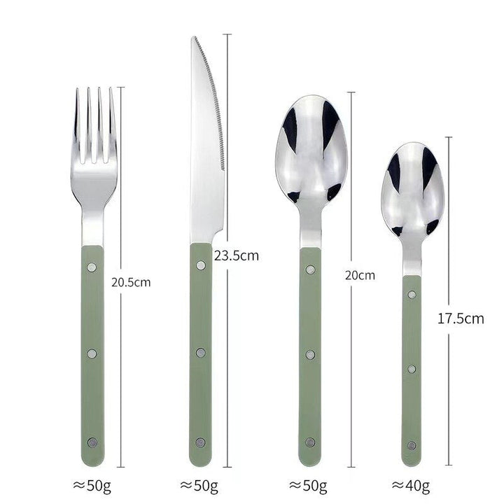 Elegant flatware set displayed for a formal dinner party setup