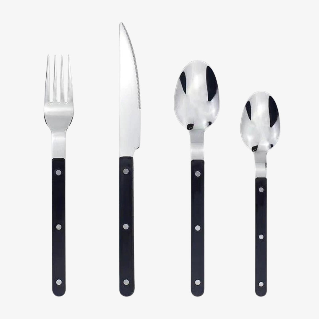Black stainless steel cutlery pieces including fork, knife, spoon, and teaspoon
