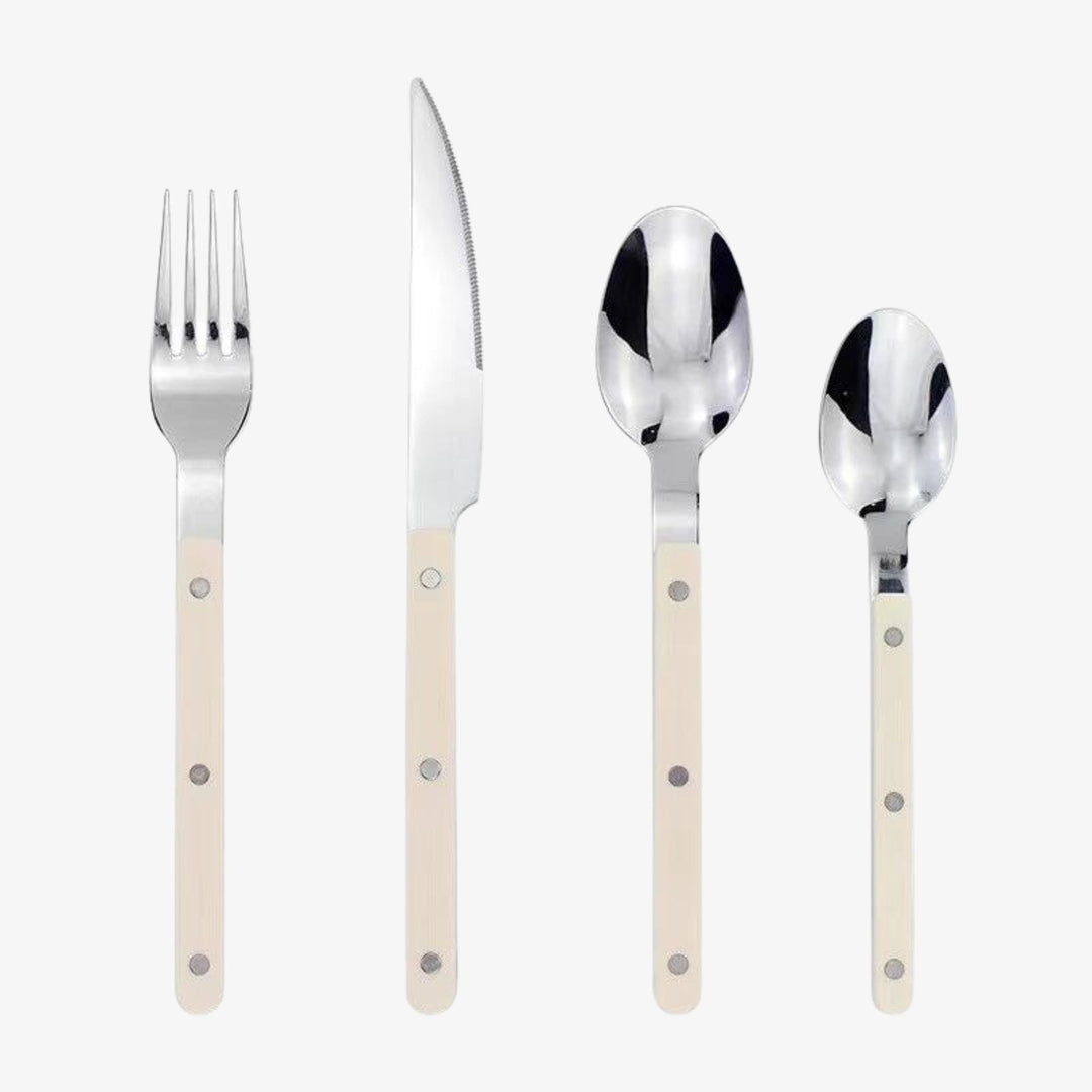 Top-down view of the 24-piece cutlery set organized in a gift box
