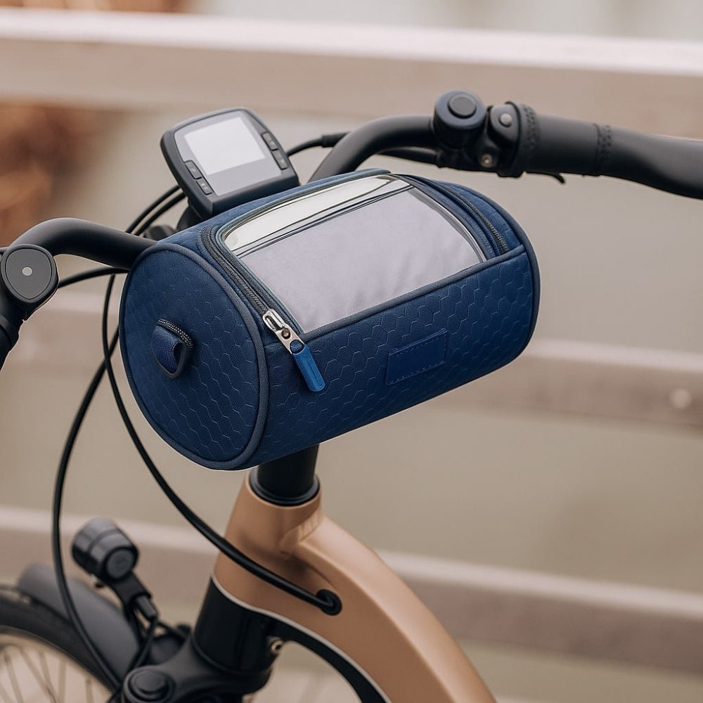 Dark blue waterproof bike handlebar bag installed securely on bicycle handlebars