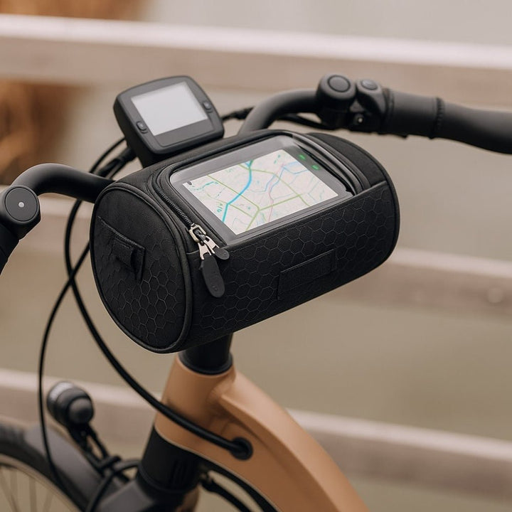 Black waterproof bike handlebar bag mounted on bicycle with touchscreen phone window