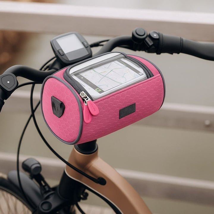 Lifestyle shot of waterproof bike handlebar bag installed on a bicycle outdoors