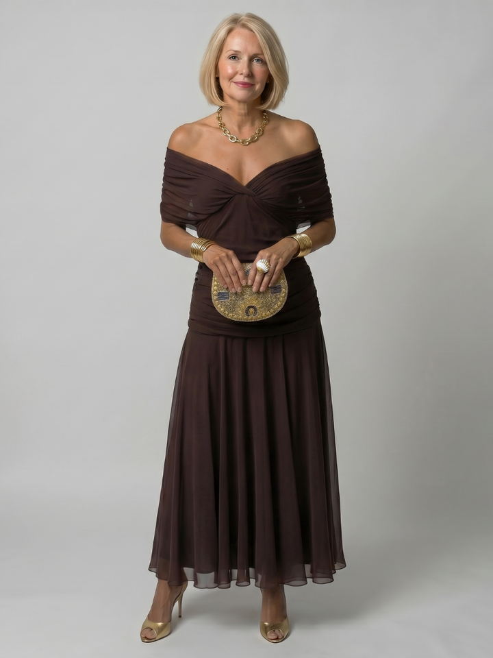 Elegant women party dress featuring floral print and ruched bodice