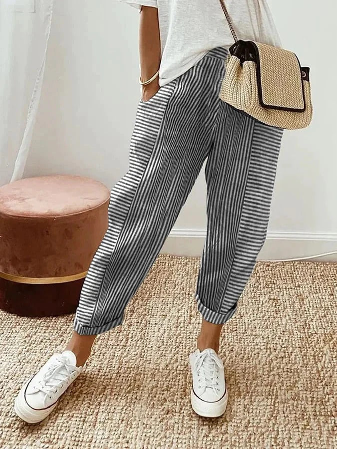 Close up fabric detail of breathable summer style striped pants for women