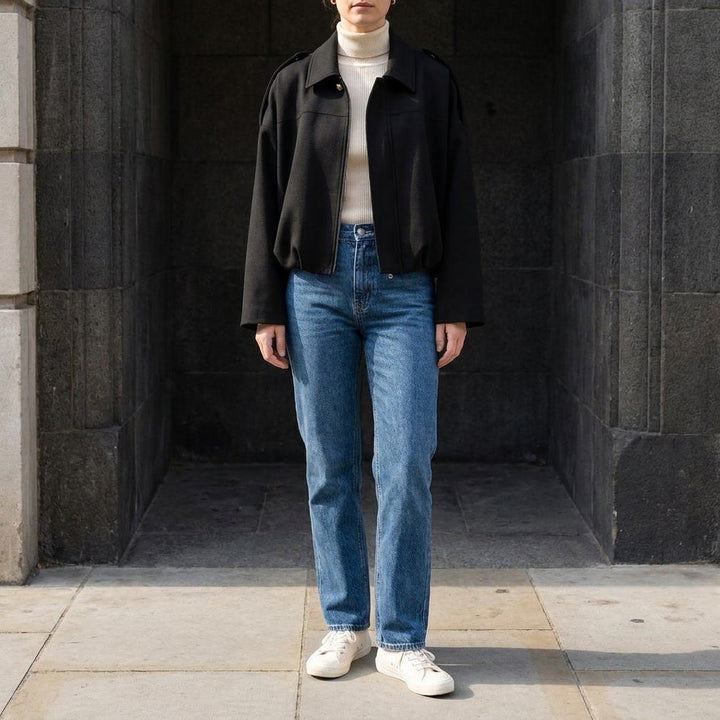 Full length view of woman wearing cropped bomber and tailored waist