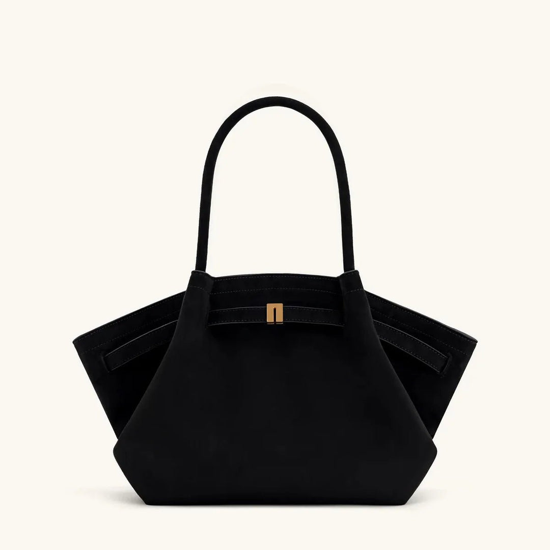 Side profile of the stylish accessory showing expandable storage