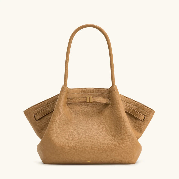 Tan brown women's shoulder bag displayed against a neutral background