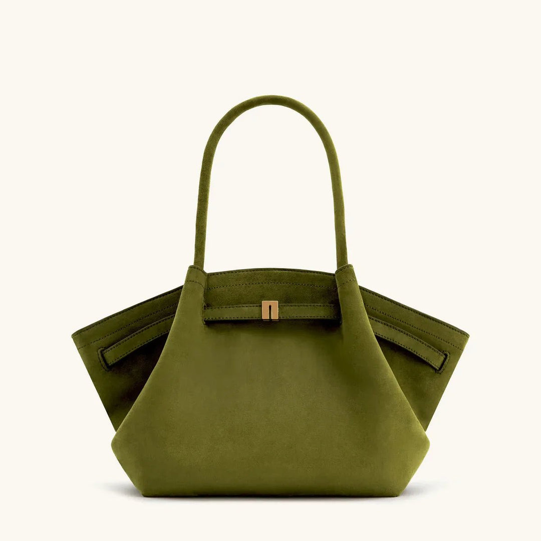 Green women's shoulder bag with structured design and top handles