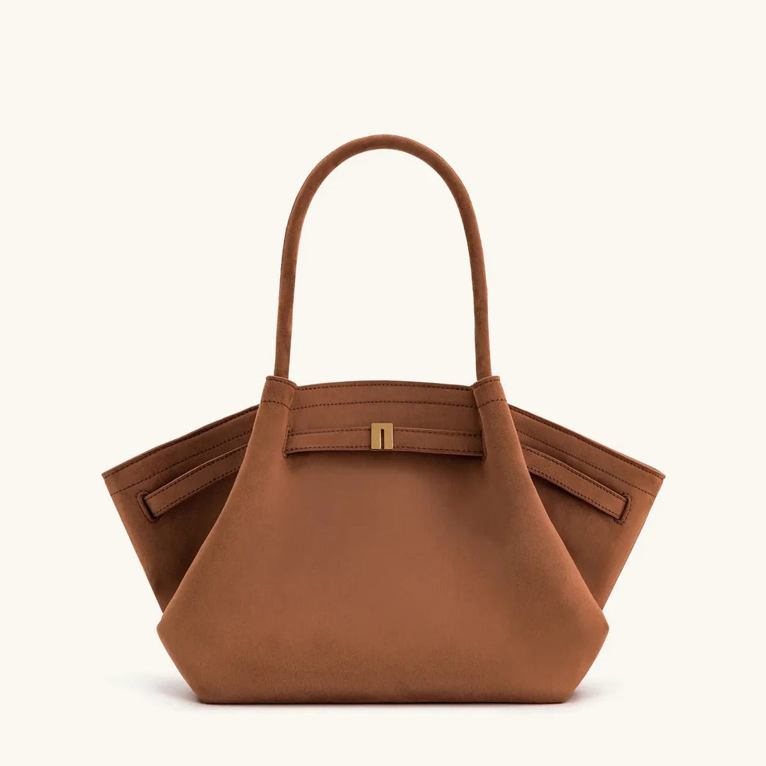 Close-up of sturdy strap attachment on the women's bag