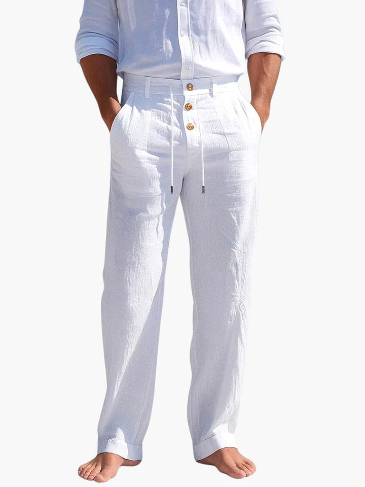 Man wearing white breathable summer trousers with drawstring waist