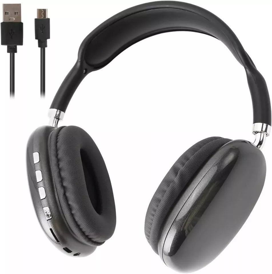 Wireless audio headset resting on a modern desk setup next to a smartphone