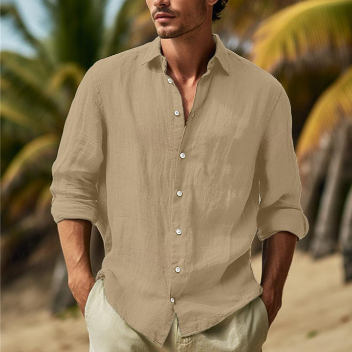 Flat lay of mens casual button-down shirt styled for summer wear
