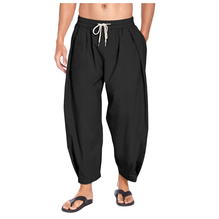 Man wearing black drop crotch harem pants