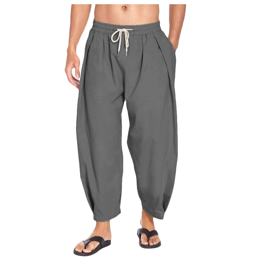 Man wearing gray drop crotch harem pants