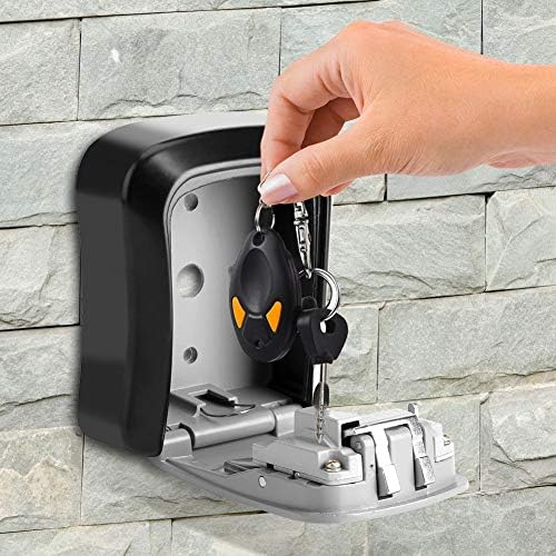 Weather-resistant key storage safe installed securely on an exterior brick wall