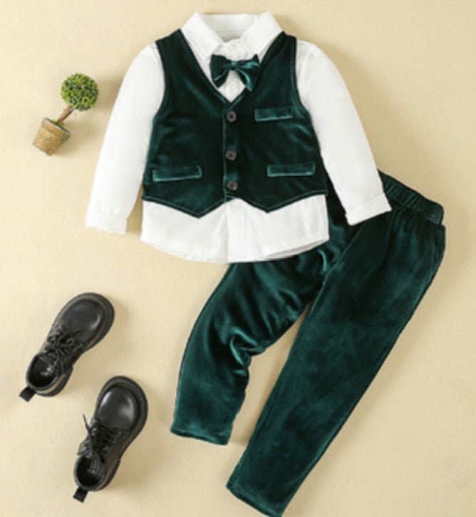 Complete boys suit set laid out showing jacket vest pants and tie