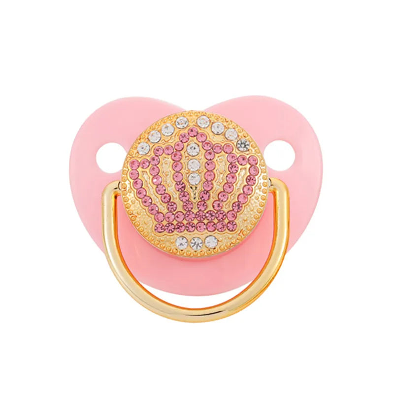 Pink A baby silicone pacifier soother with crown crystal design